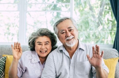 senior-couple-say-hi-look-camera senior-couple-say-hi-look-camera